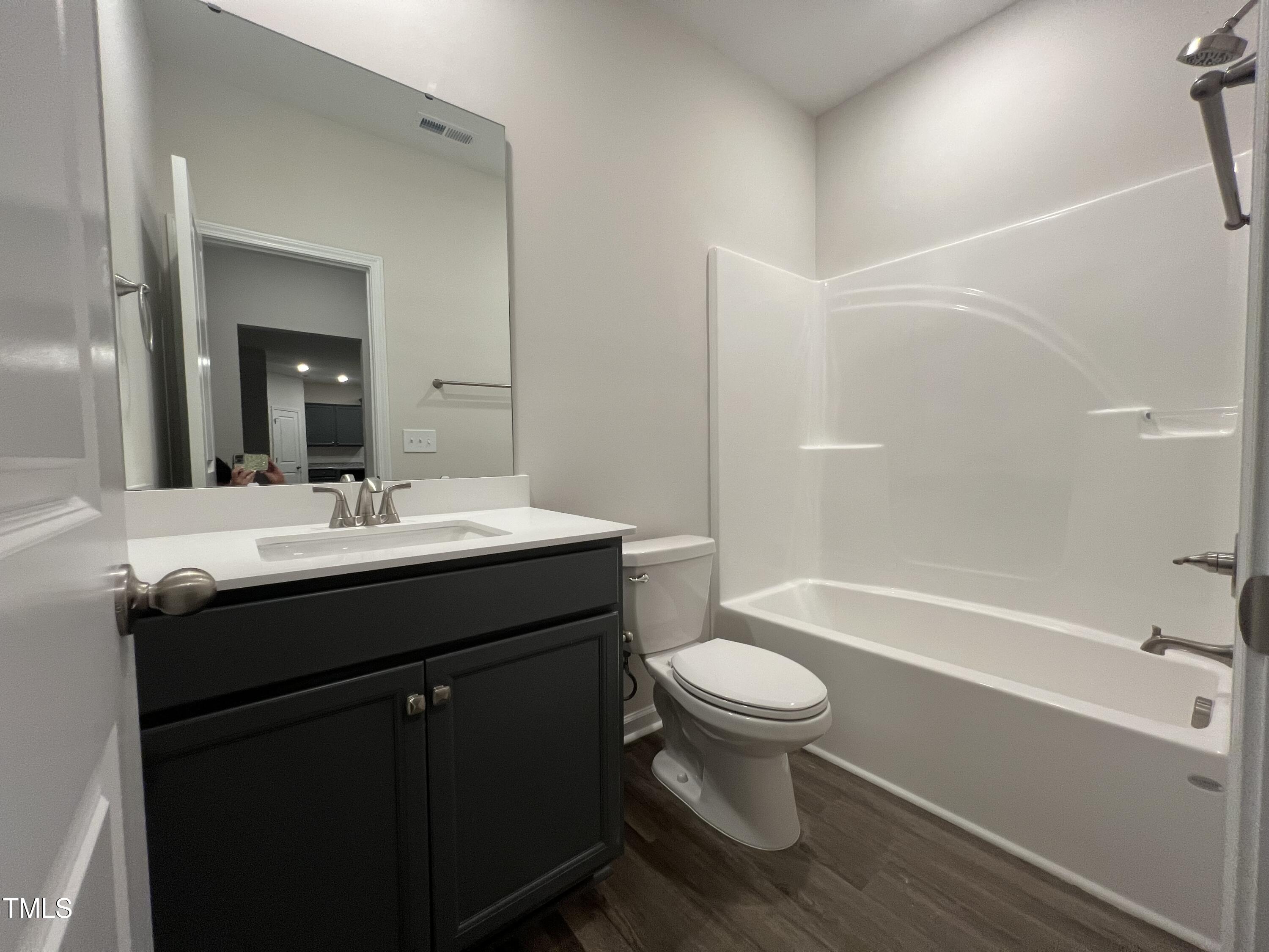 259 Palomo Place Raeford, NC 28376 - Photo 10 of 23 a bathroom with a sink a toilet and a bathtub