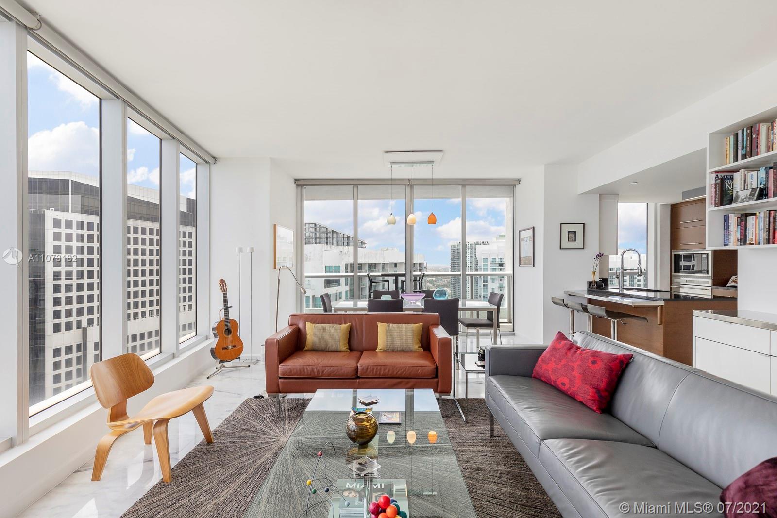 485 Brickell Avenue, Unit 4108 Miami, FL 33131 - Photo 7 of 21 a living room with furniture and a large window