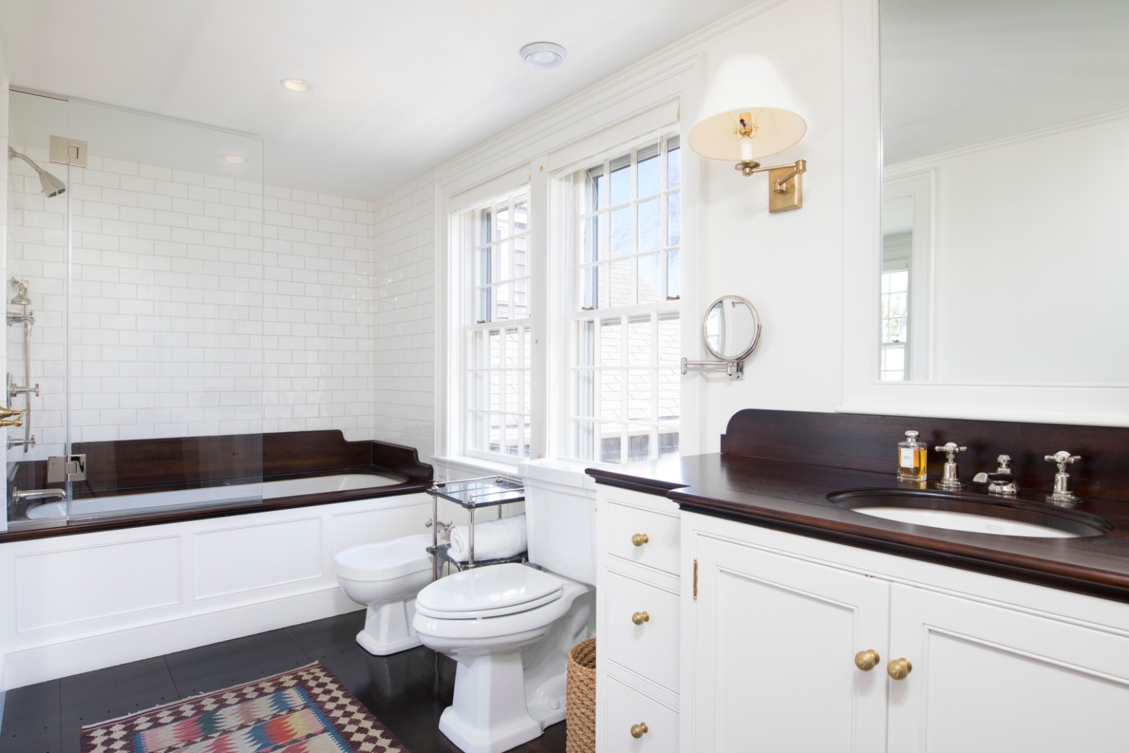 1 Twin Street Nantucket, MA 02554 - Photo 22 of 32 a bathroom with a bathtub a sink a toilet and a window