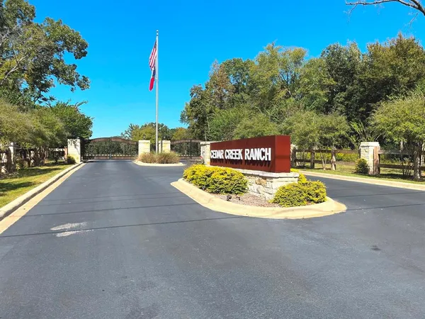 a view of a park with welcome board