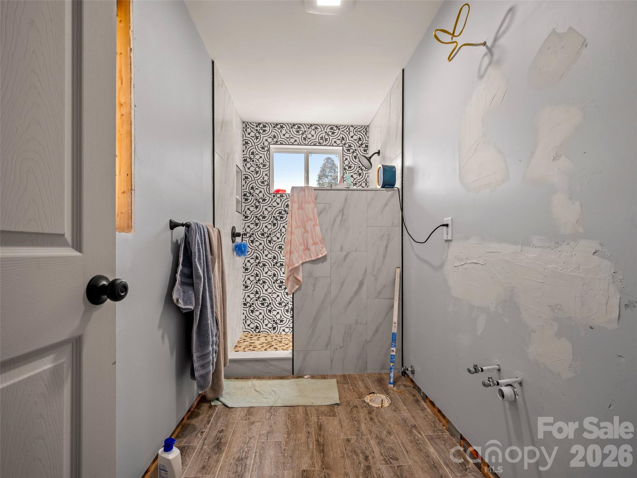 120 East Howard Street Tryon, NC 28782 - Photo 20 of 31 a bathroom with a shower