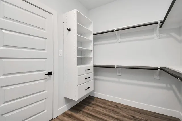 a view of an empty walk in closet