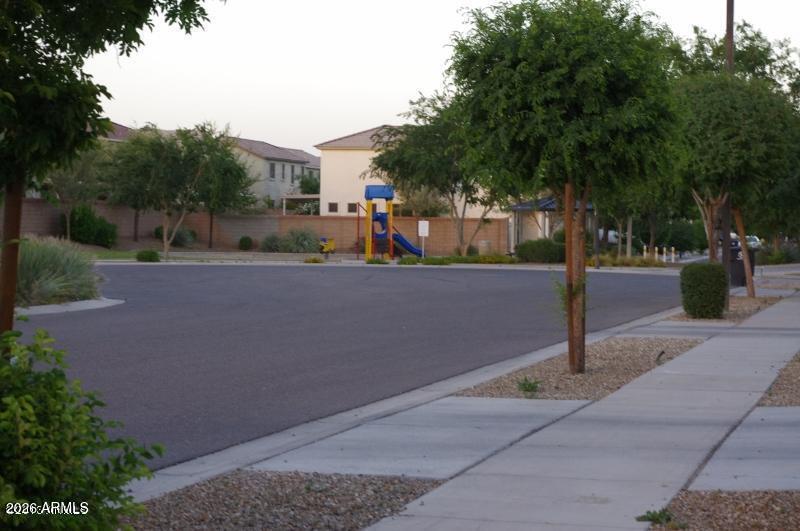 17537 West Banff Lane Surprise, AZ 85388 - Photo 3 of 11 a view of a street with houses