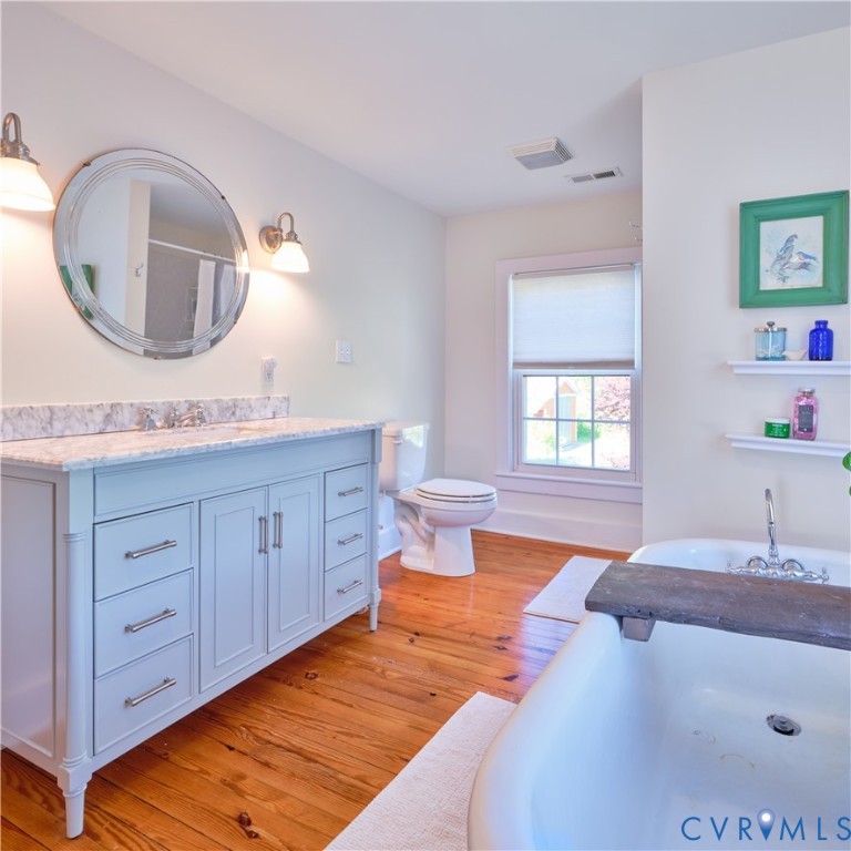 4970 Mt Landing Road Tappahannock, VA 22560 - Photo 28 of 48 a spacious bathroom with a double vanity sink and a mirror