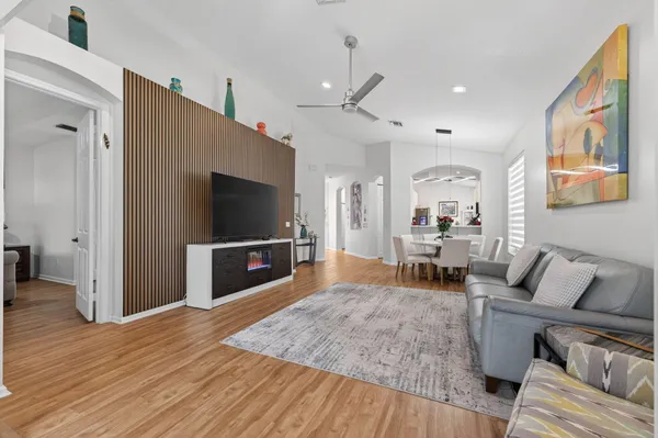 a living room with furniture and a window