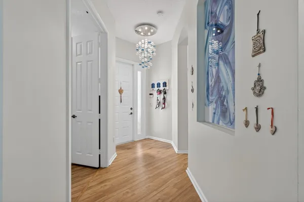 a view of a livingroom with wooden floor
