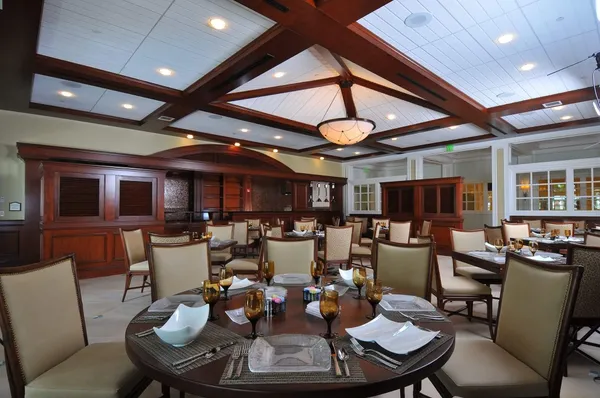 a view of a chairs and tables in the patio