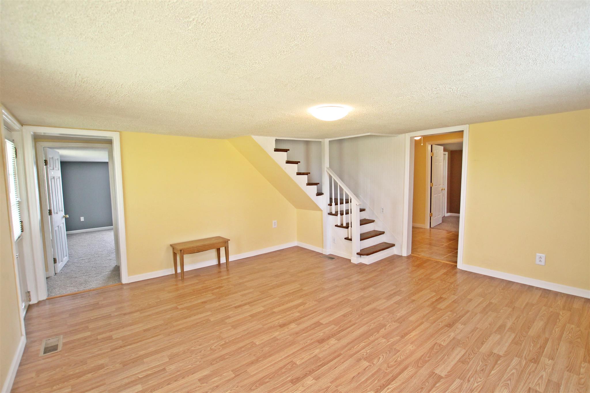 4323 Dot Road Springfield, TN 37172 - Photo 3 of 24 a view of an empty room with stairs and ventilation
