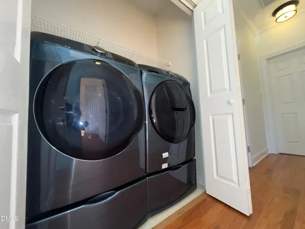 a bathroom with a sink a vanity a mirror and a shower