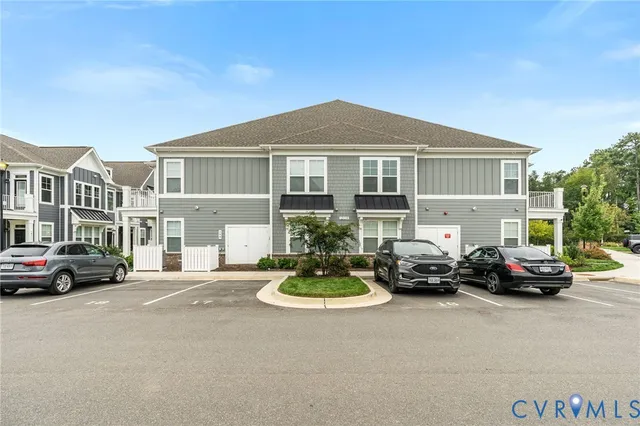 a car parked in front of a house