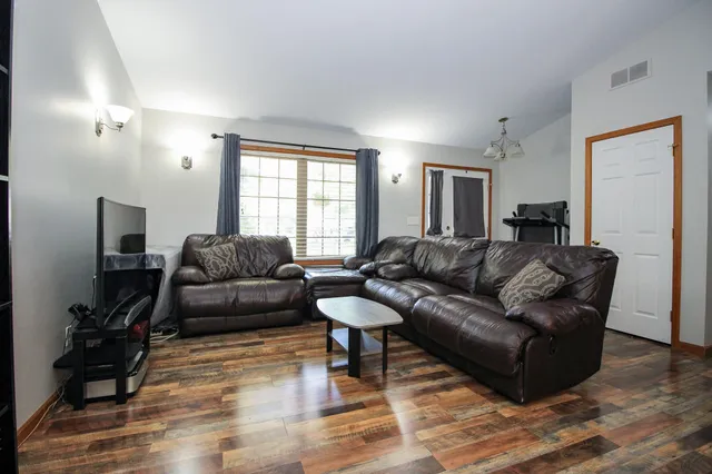 a living room with furniture and a couch