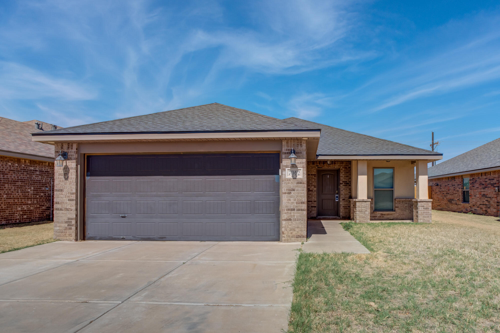 7012 34th Place Lubbock, TX 79407 - Photo 1 of 36 7012-34th-Pl_Lubbock-TX_1_Front-Exterior