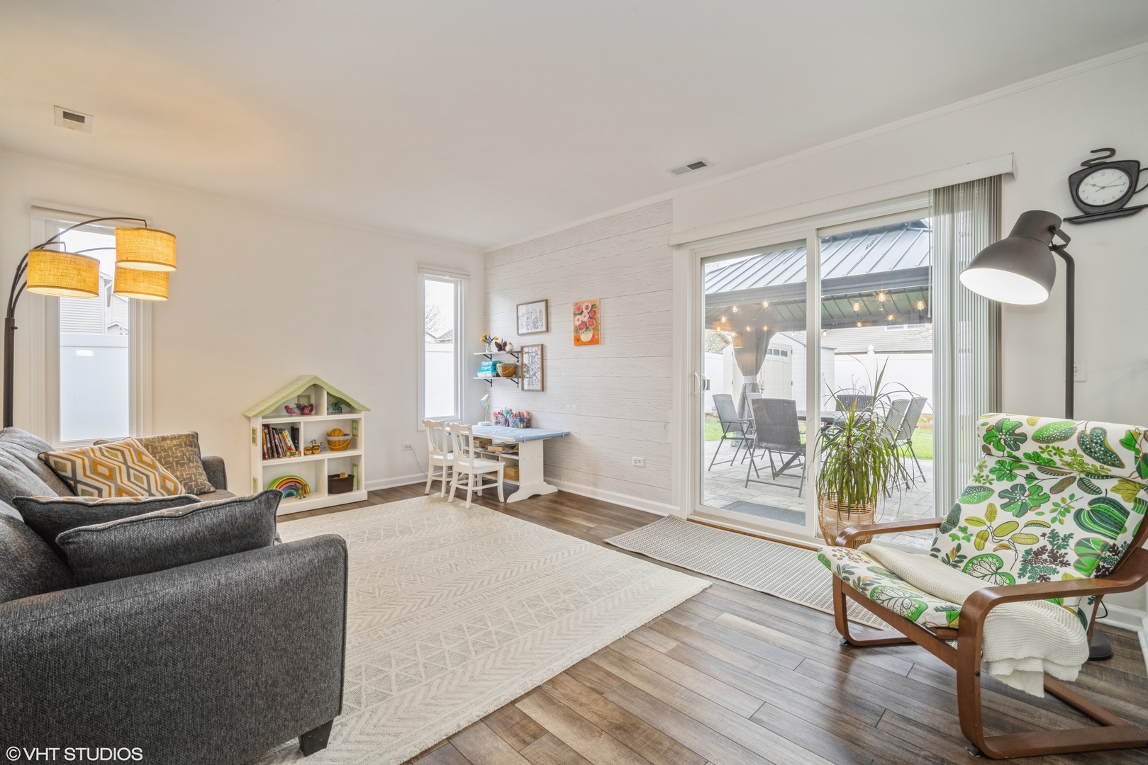 1145 John Drive Hoffman Estates, IL 60169 - Photo 15 of 36 a living room with furniture and a large window
