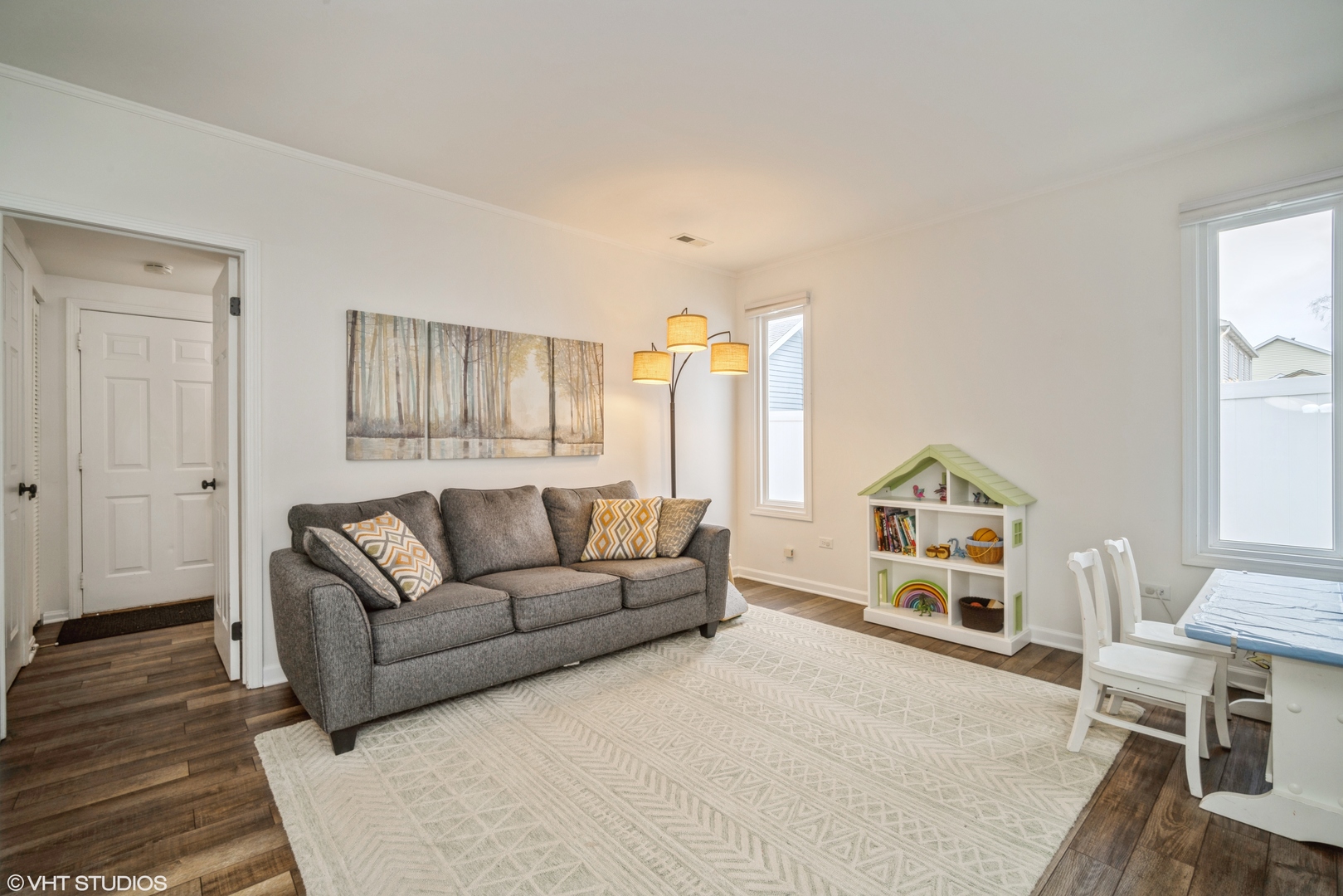 1145 John Drive Hoffman Estates, IL 60169 - Photo 16 of 36 a living room with furniture and a large window