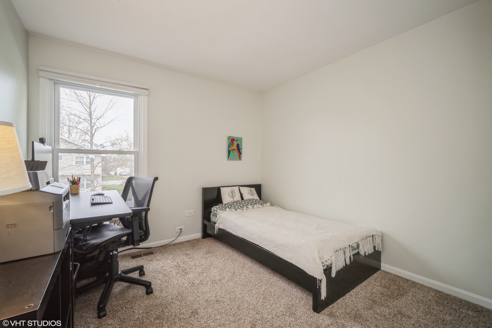 1145 John Drive Hoffman Estates, IL 60169 - Photo 20 of 36 a bed room with a bed window and a desk
