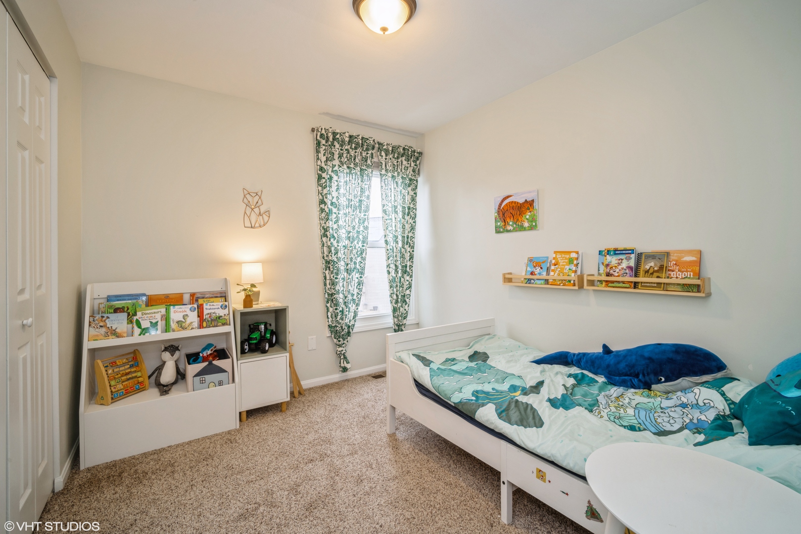1145 John Drive Hoffman Estates, IL 60169 - Photo 22 of 36 a living room with furniture and a window
