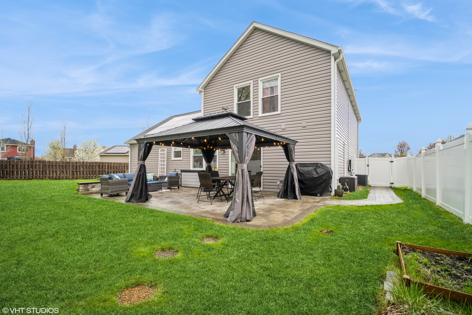 1145 John Drive Hoffman Estates, IL 60169 - Photo 32 of 36 a view of a house with backyard and porch