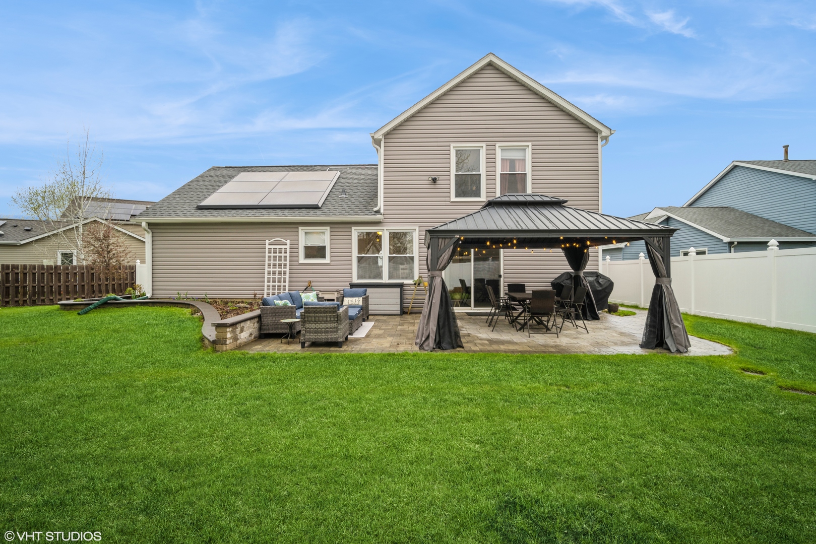 1145 John Drive Hoffman Estates, IL 60169 - Photo 33 of 36 a view of a house with a yard and sitting area