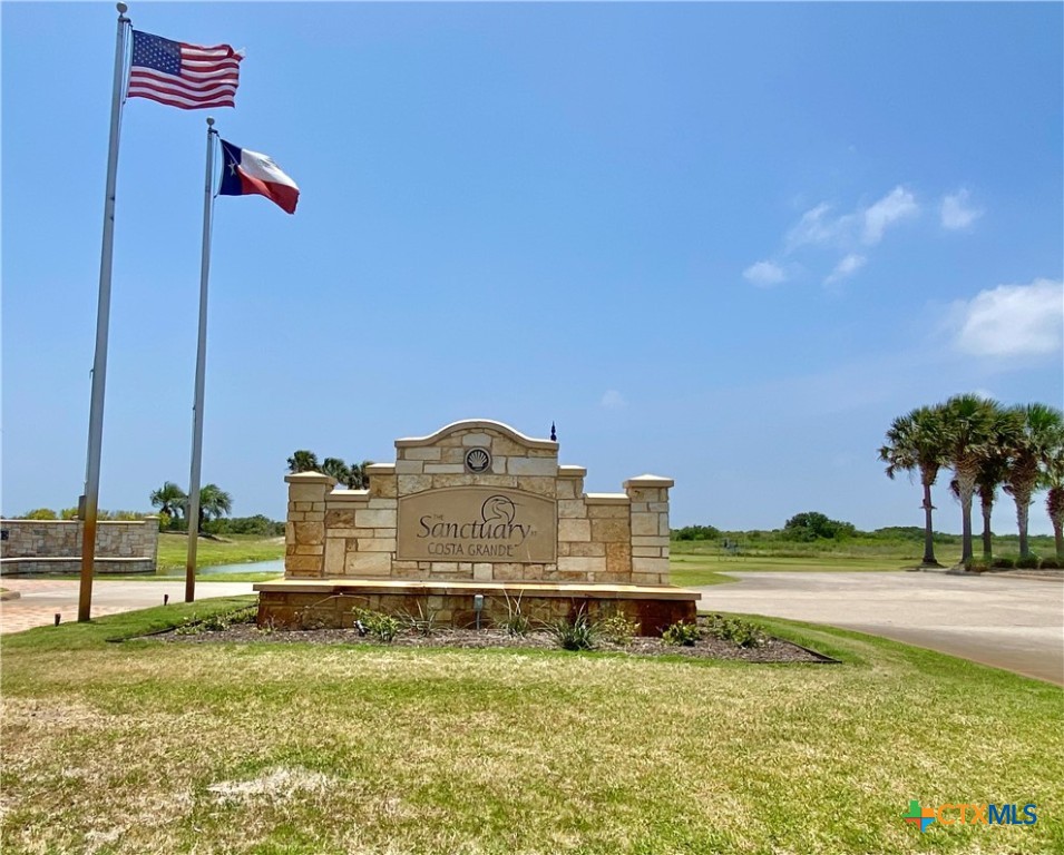 108 Coastal Springs Port O'Connor, TX 77982 - Photo 1 of 3 a view of a swimming pool with a yard
