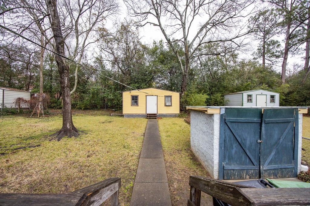 2103 Terrace Drive Columbus, GA 31904 - Photo 13 of 15 a view of a backyard with a tree