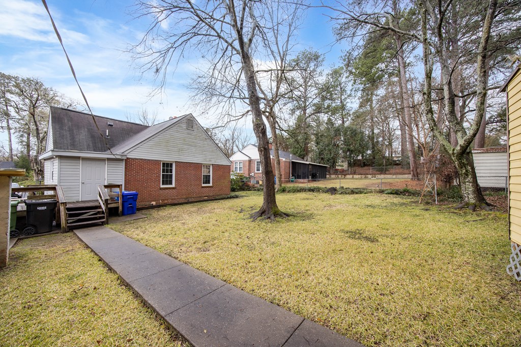 2103 Terrace Drive Columbus, GA 31904 - Photo 14 of 15 a view of a yard with a house and a tree
