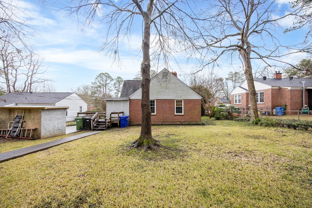 2103 Terrace Drive Columbus, GA 31904 - Photo 15 of 15 a view of a house with a yard covered in snow