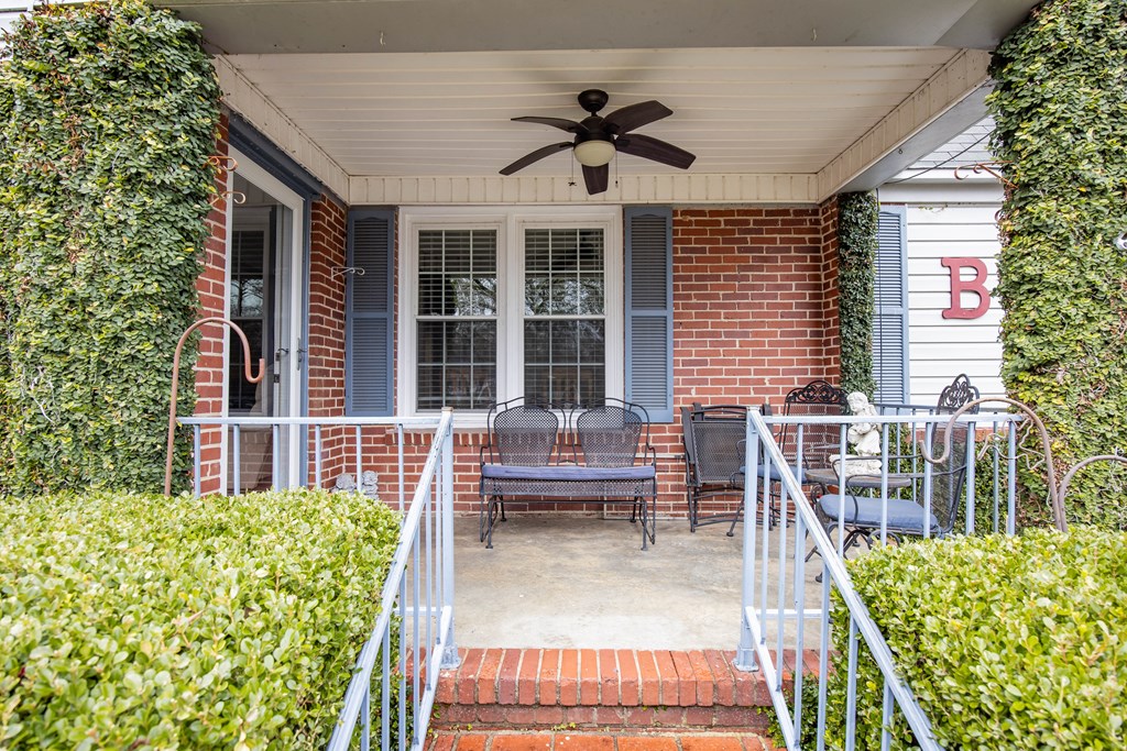 2103 Terrace Drive Columbus, GA 31904 - Photo 2 of 15 a balcony with furniture and a potted plant