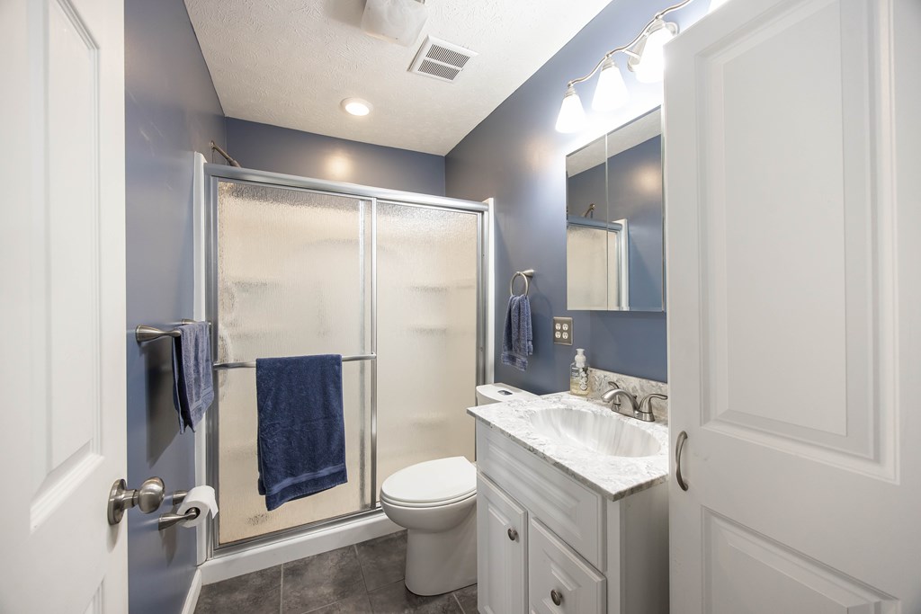 2103 Terrace Drive Columbus, GA 31904 - Photo 9 of 15 a bathroom with a toilet sink and shower