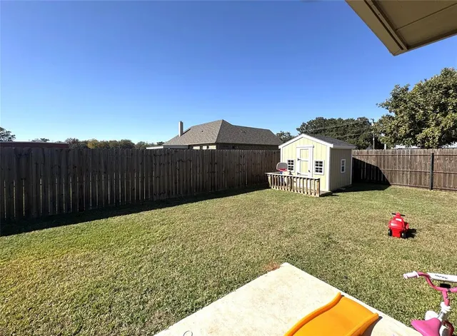 a view of balcony and with yard
