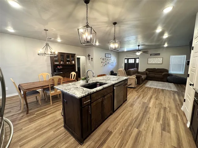 a large kitchen with stainless steel appliances kitchen island a large island in the center