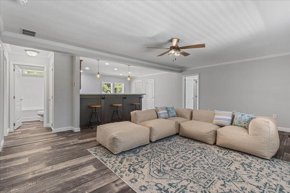 1629 Wasson Road Ten Mile, TN 37880 - Photo 12 of 27 a living room with furniture and a chandelier