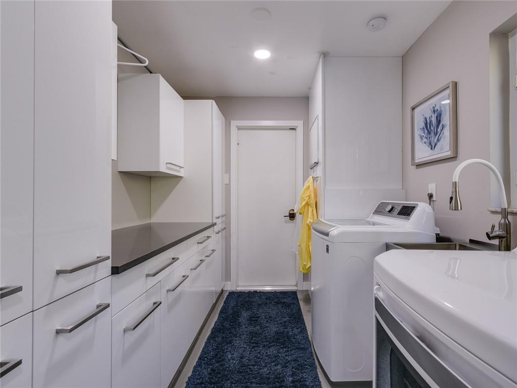 6190 Northwest 4th Avenue Boca Raton, FL 33487 - Photo 24 of 48 Laundry room with lots of storage