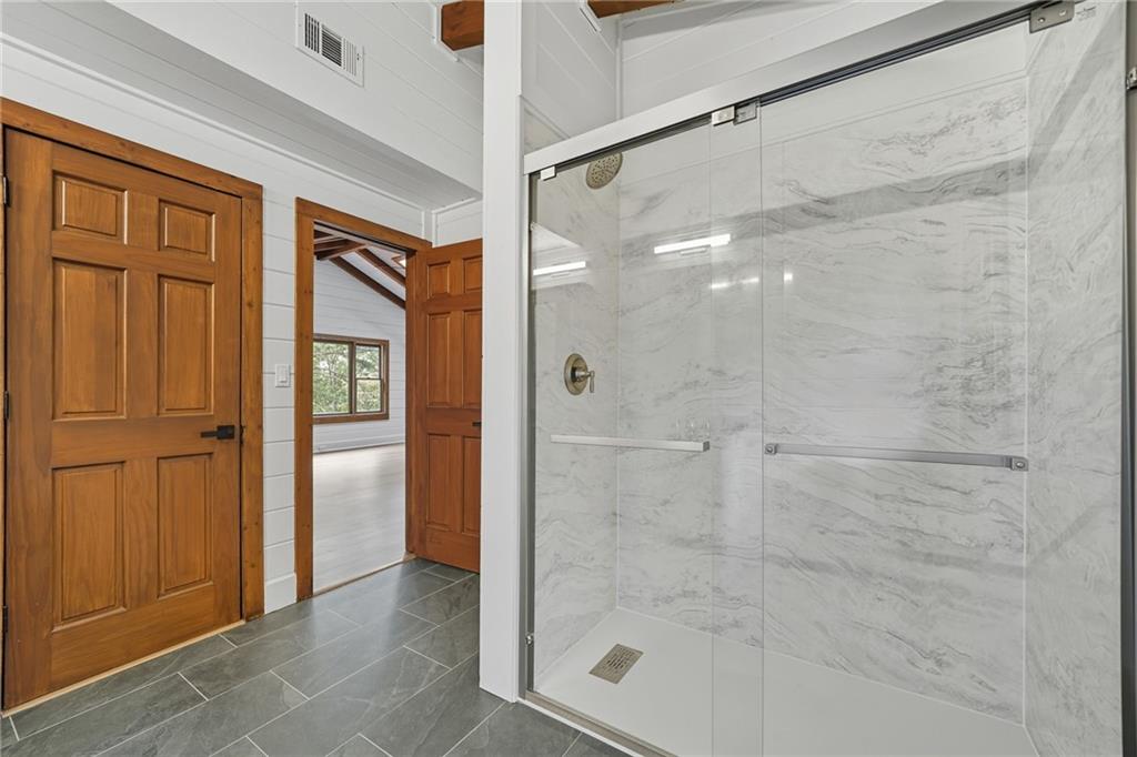 509 East Valley Road Northeast Rydal, GA 30171 - Photo 22 of 27 a bathroom with a shower