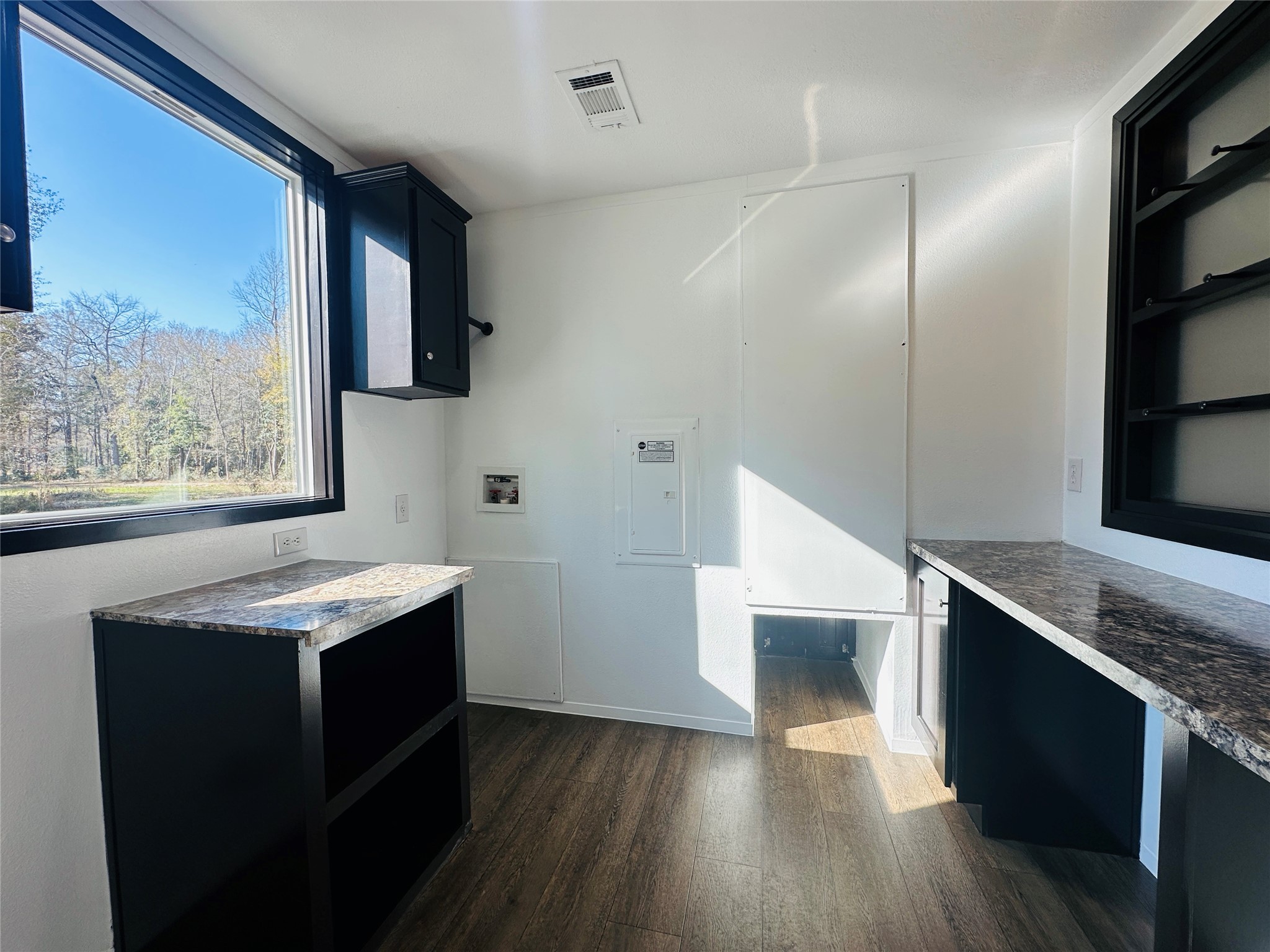 145 Campbell Street Shepherd, TX 77371 - Photo 11 of 36 a kitchen with stainless steel appliances granite countertop a sink stove and refrigerator