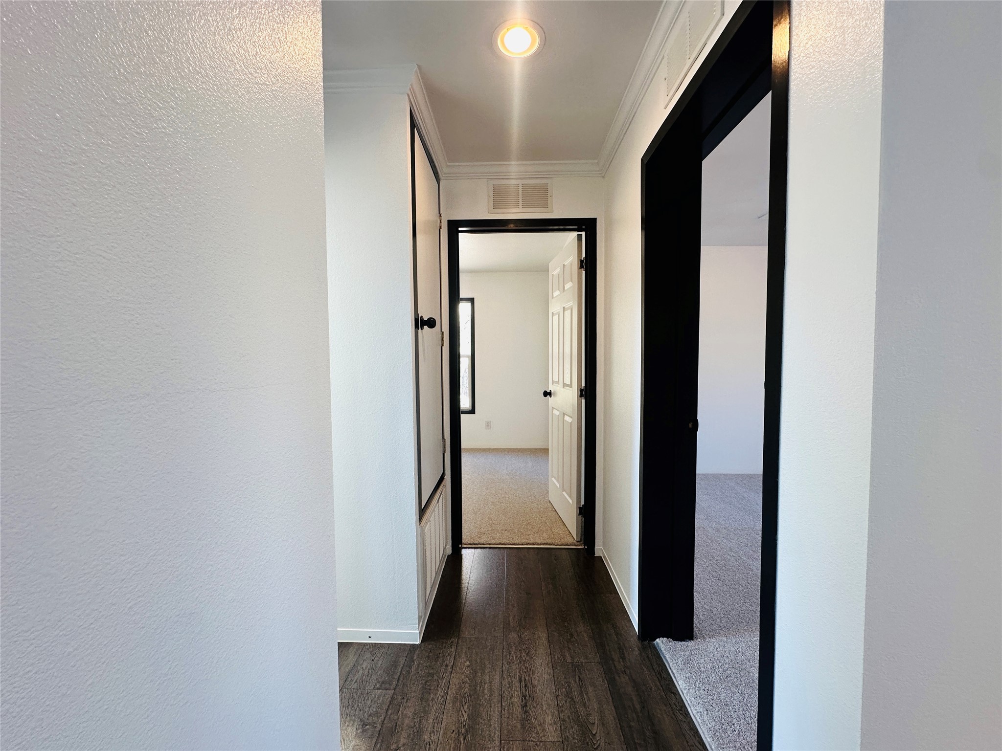 145 Campbell Street Shepherd, TX 77371 - Photo 12 of 36 a view of a hallway with wooden floor
