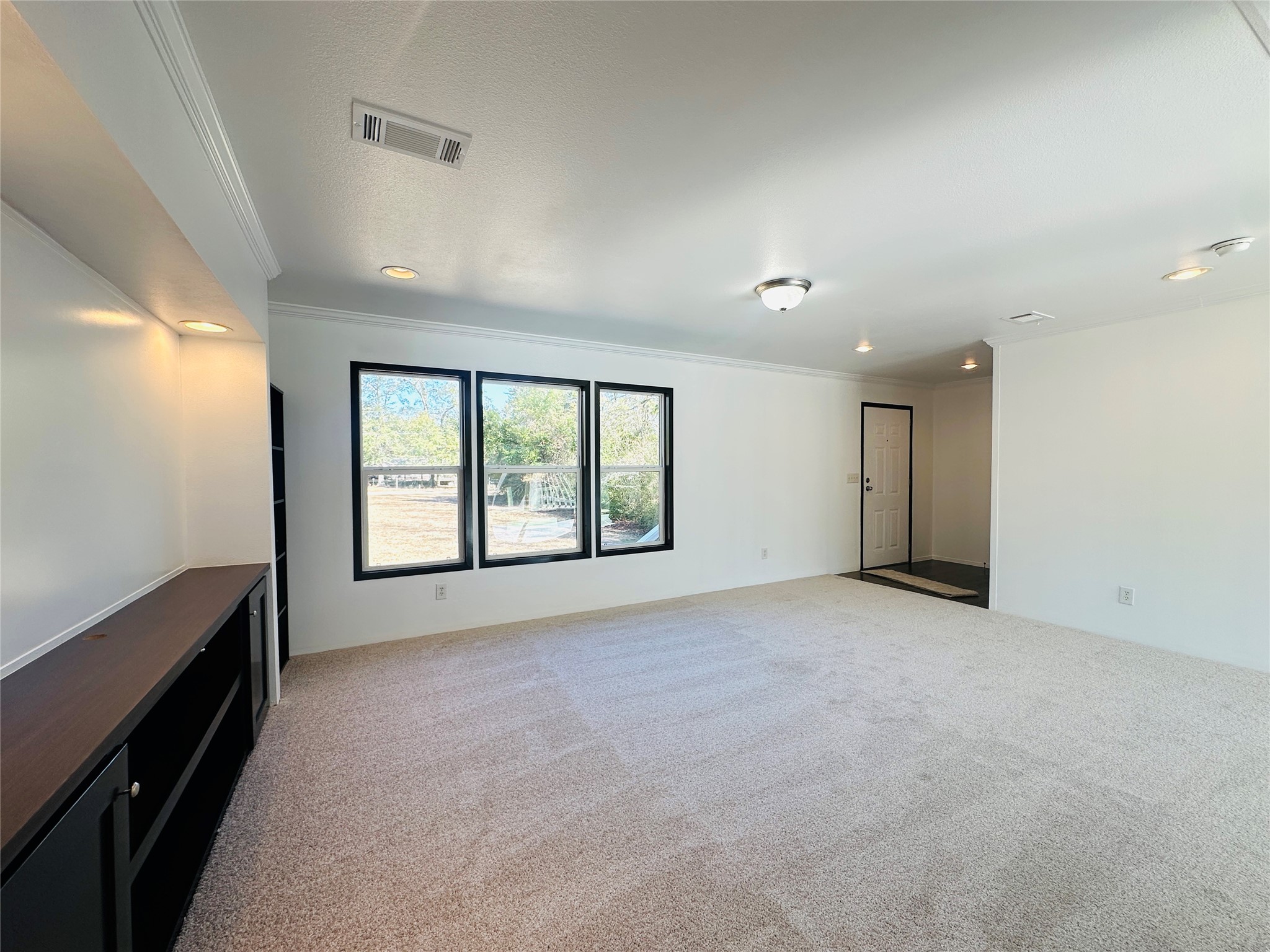 145 Campbell Street Shepherd, TX 77371 - Photo 17 of 36 a view of an empty room with a window