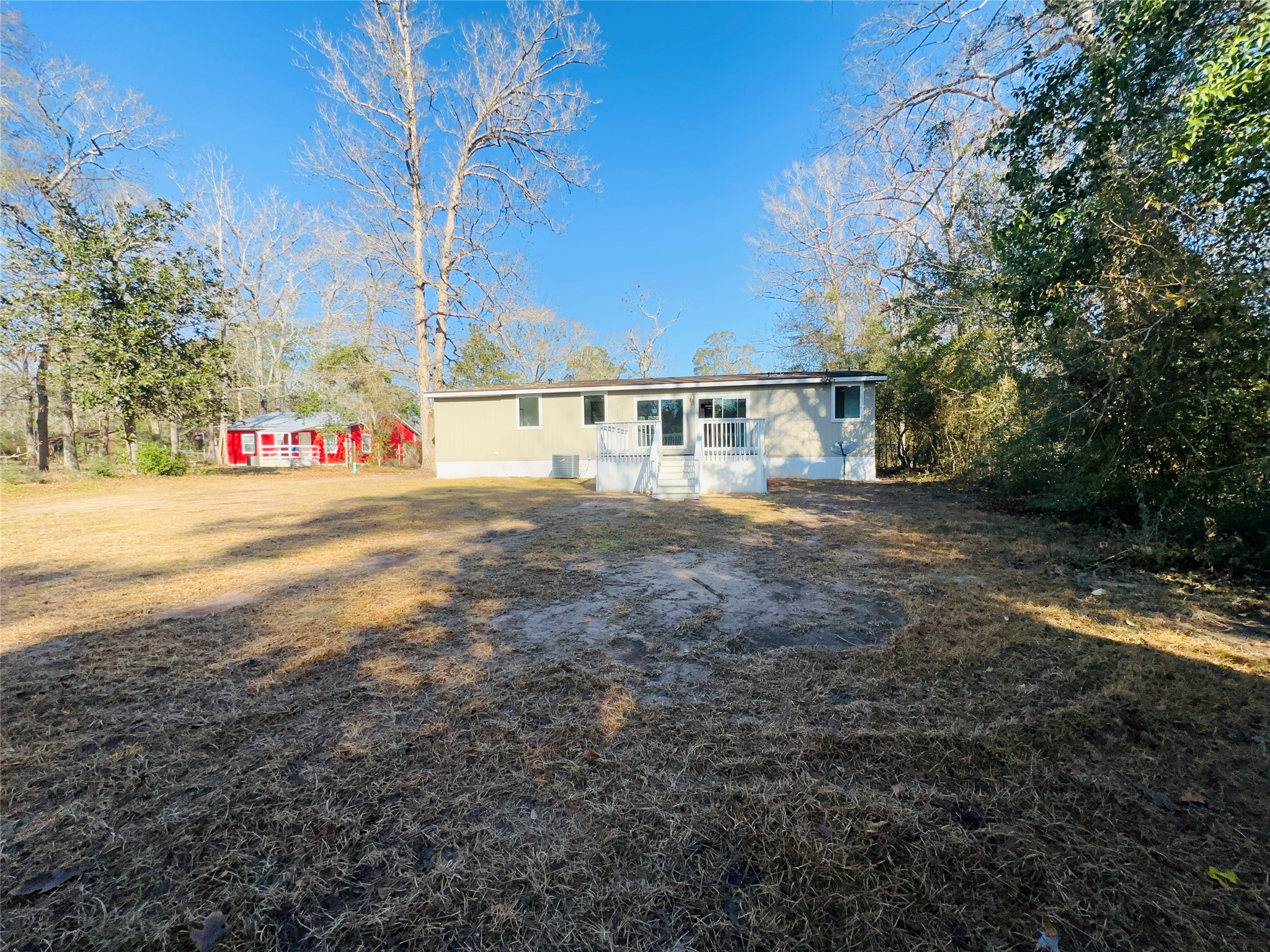 145 Campbell Street Shepherd, TX 77371 - Photo 29 of 36 a view of an outdoor space and yard