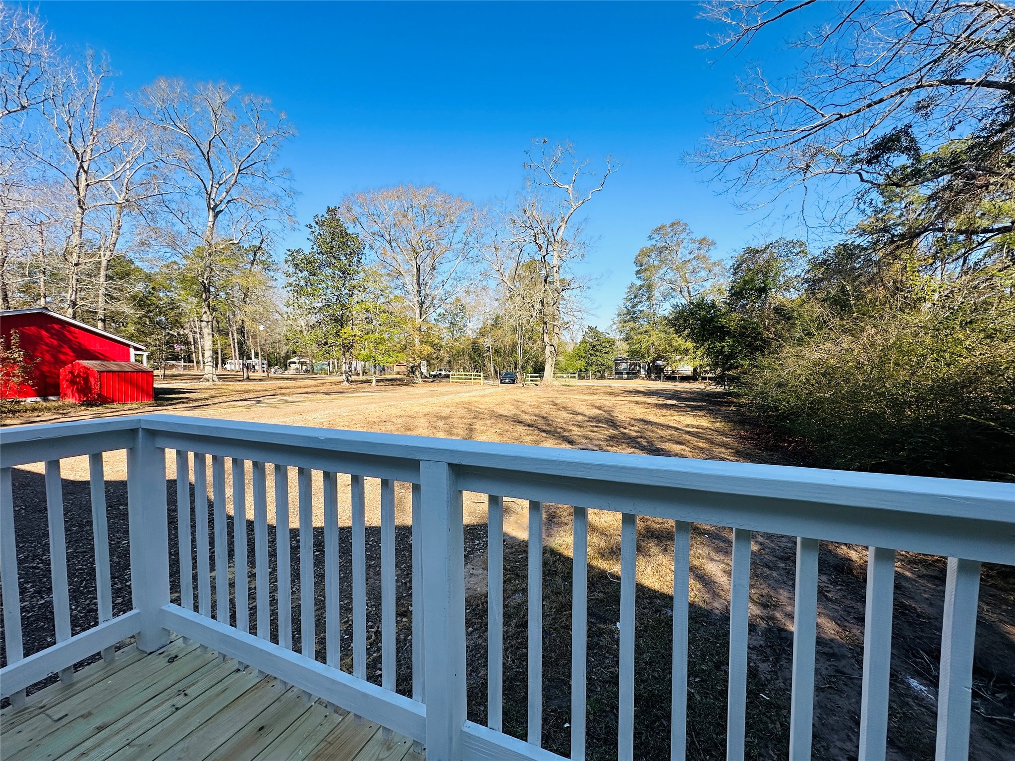 145 Campbell Street Shepherd, TX 77371 - Photo 32 of 36 a view of a wooden deck