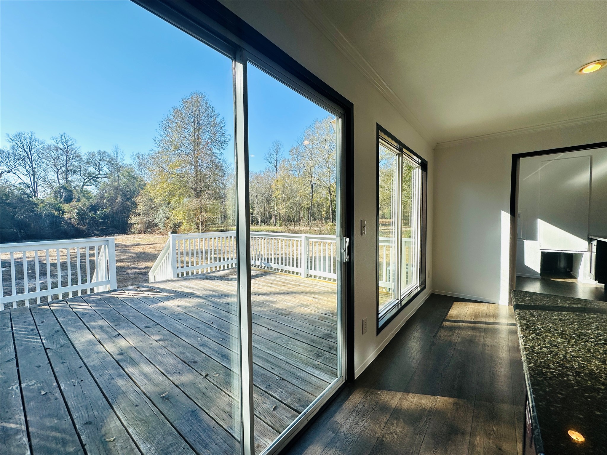 145 Campbell Street Shepherd, TX 77371 - Photo 8 of 36 a view of a balcony with wooden floor