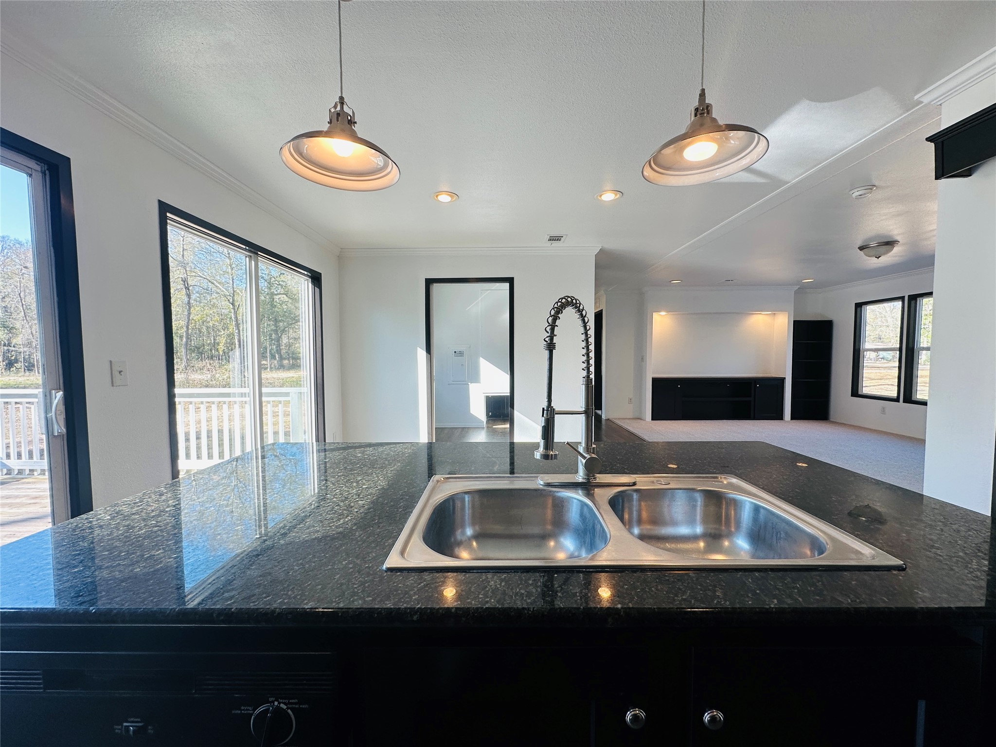 145 Campbell Street Shepherd, TX 77371 - Photo 10 of 36 a kitchen with a sink and a window