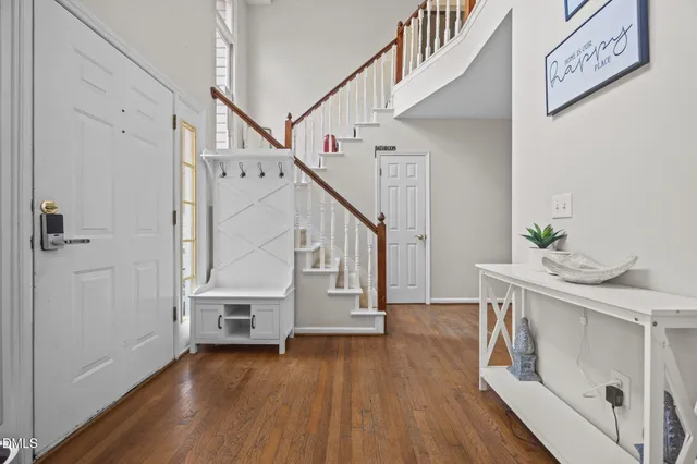 a living room with furniture and white walls