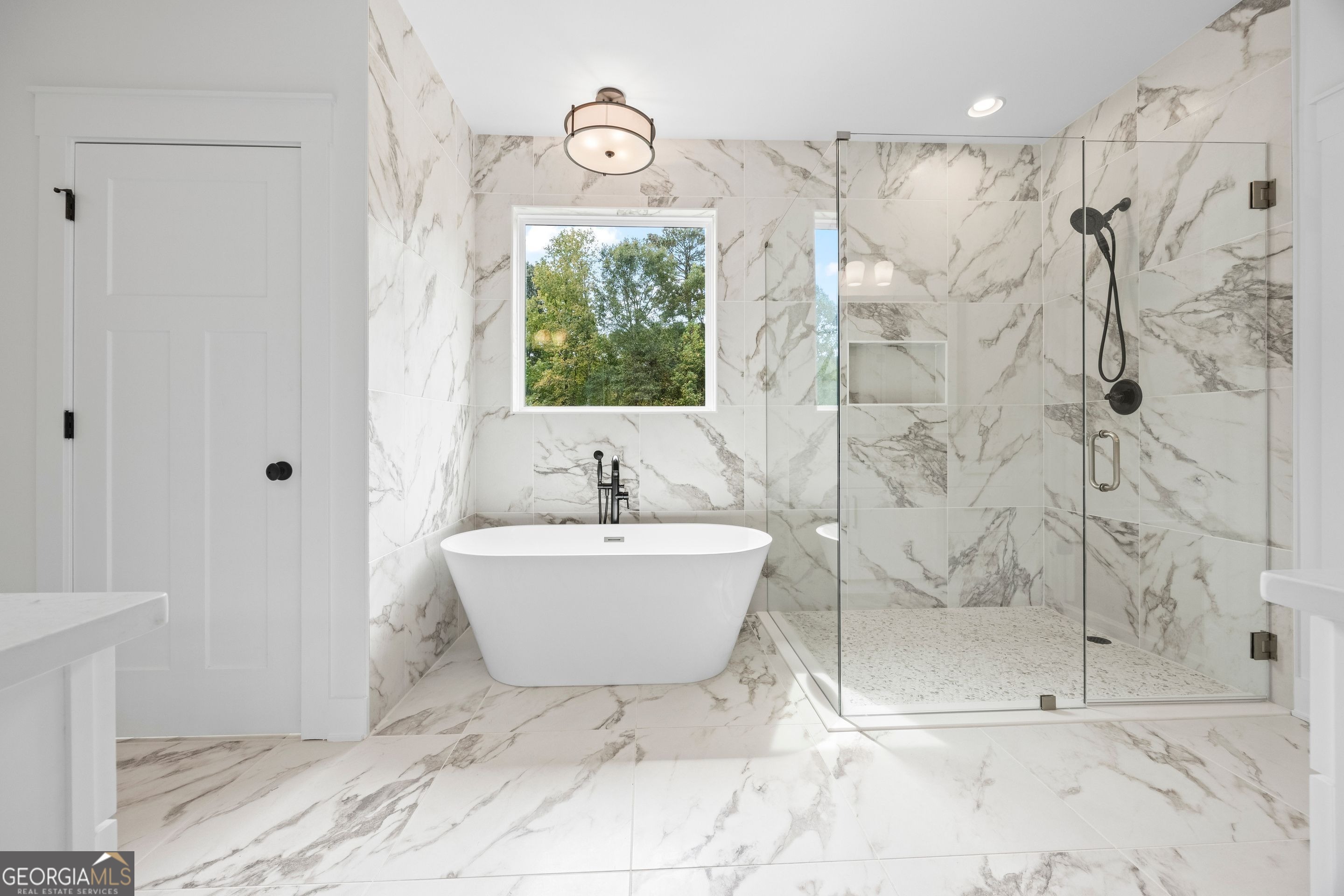 1231 John W Breedlove Road Monroe, GA 30656 - Photo 24 of 26 a bathroom with a bathtub and shower