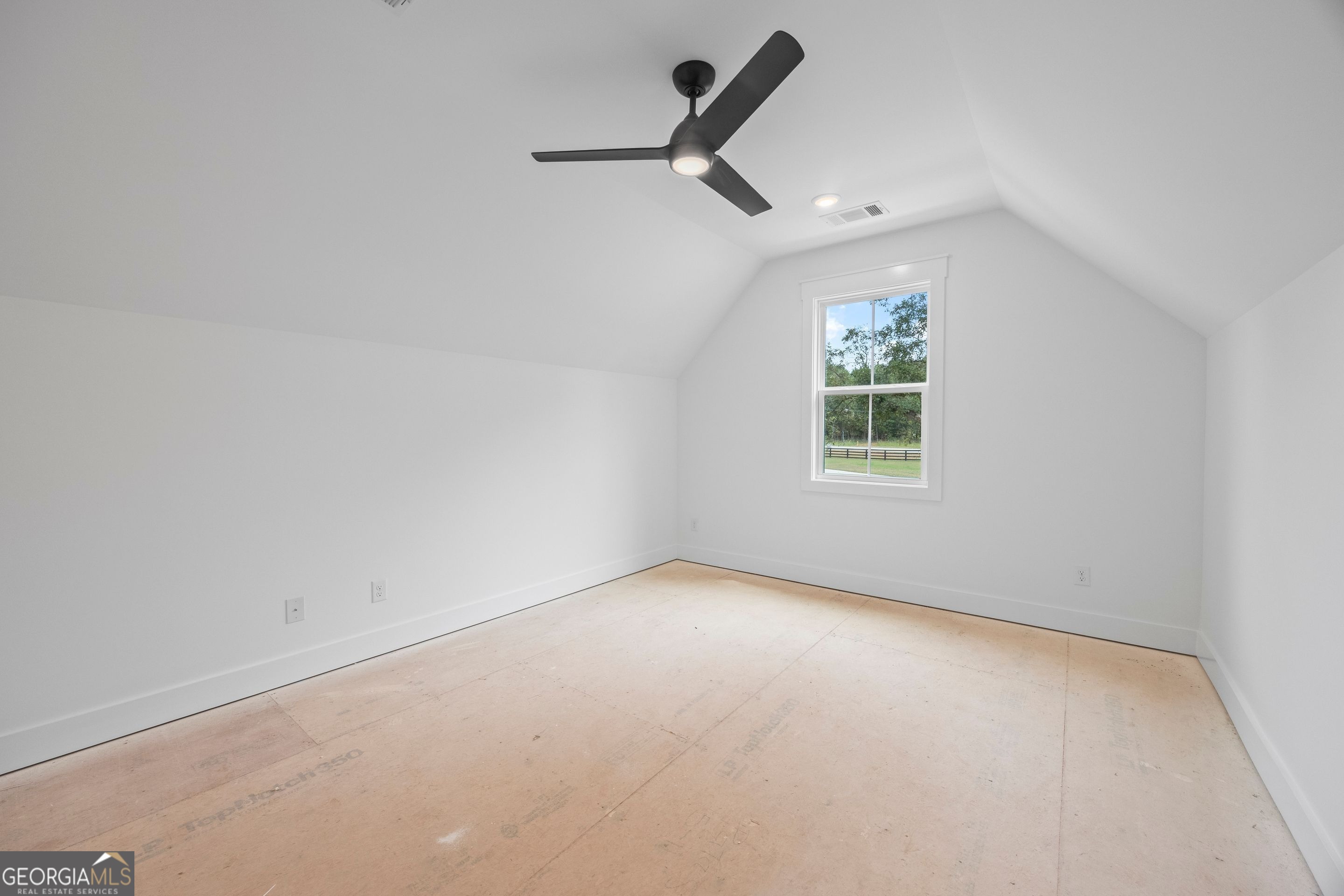 1231 John W Breedlove Road Monroe, GA 30656 - Photo 25 of 26 an empty room with a window