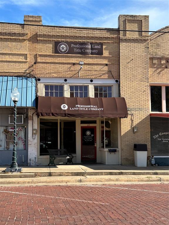 731 Northwest 1st Street Cooper, TX 75432 - Photo 9 of 9 a view of a building with a street
