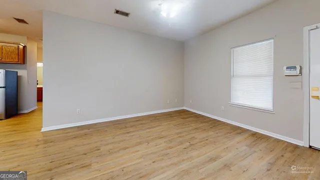 a view of an empty room with window