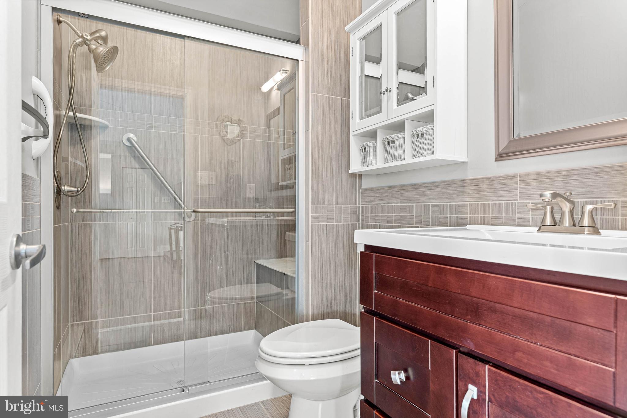 22 Russell Place Ambler, PA 19002 - Photo 20 of 65 a bathroom with a sink toilet and shower