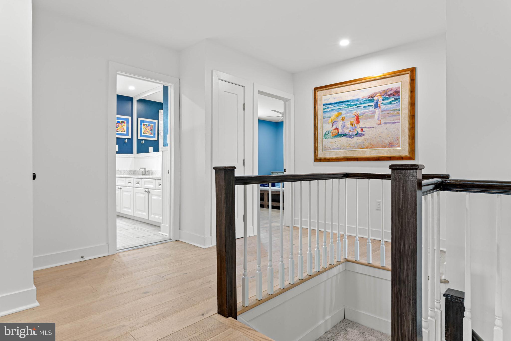 22 Russell Place Ambler, PA 19002 - Photo 30 of 65 a view of a hallway with paintings on the wall
