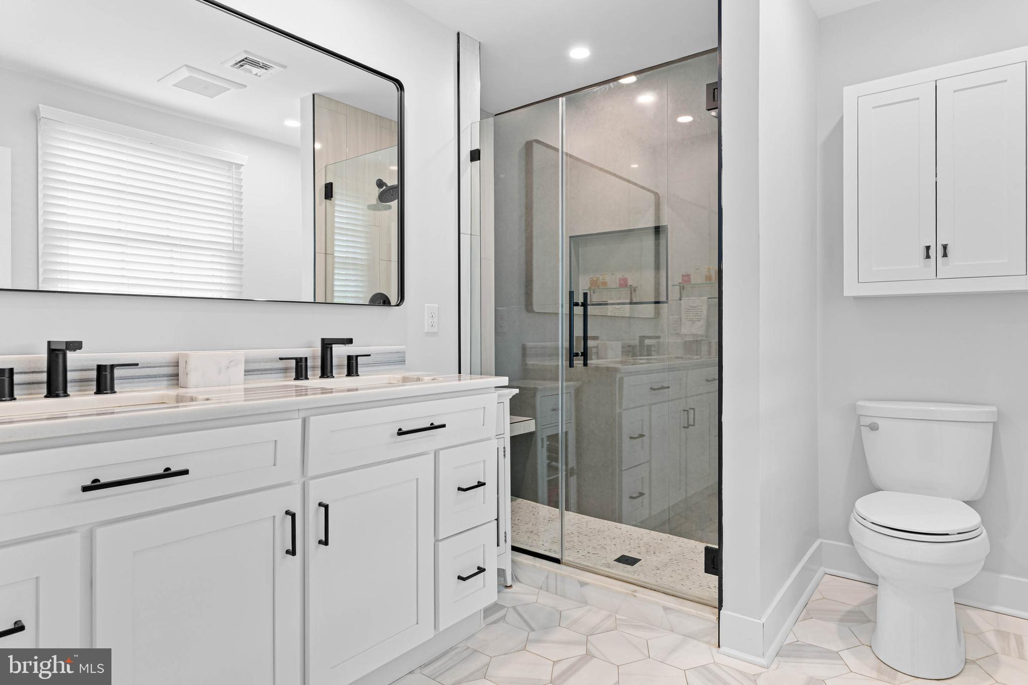 22 Russell Place Ambler, PA 19002 - Photo 34 of 65 a bathroom with a toilet sink shower and mirror