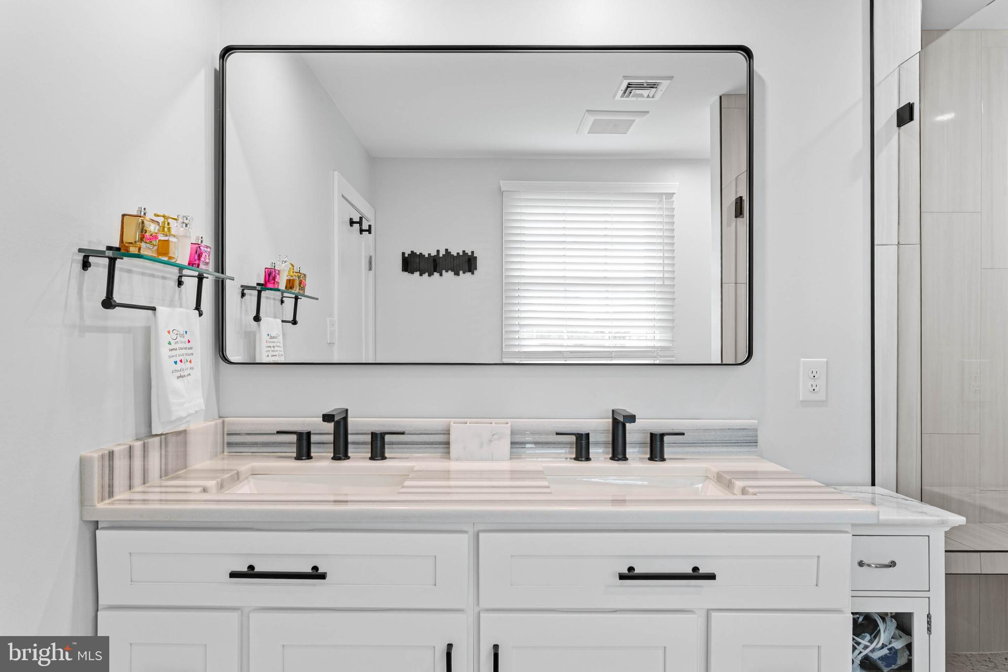 22 Russell Place Ambler, PA 19002 - Photo 35 of 65 a bathroom with a sink vanity and mirror