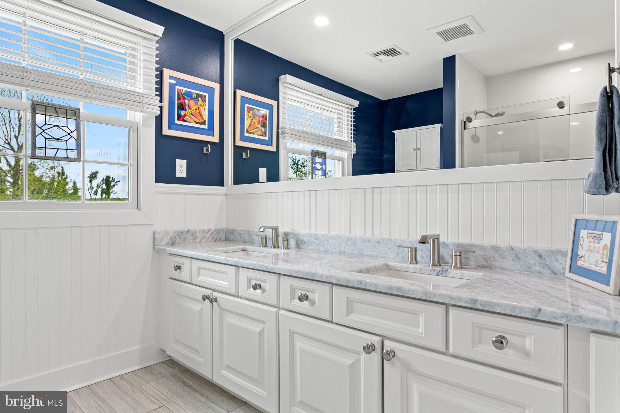 22 Russell Place Ambler, PA 19002 - Photo 41 of 65 a bathroom with a granite countertop sink and a mirror